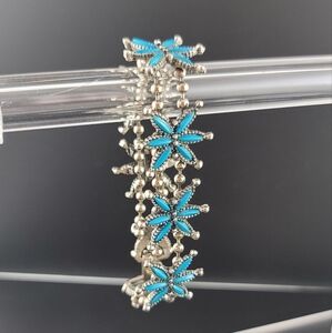 Beautiful turquoise and silver flower design bracelet